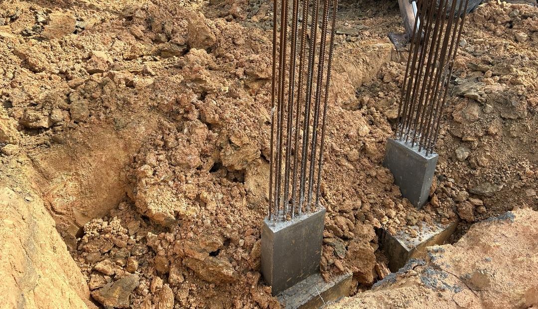 Foundation excavation with reinforcement cages in position