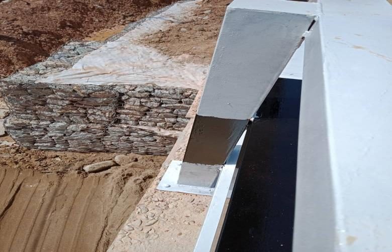 New concrete headwall at a culvert outlet