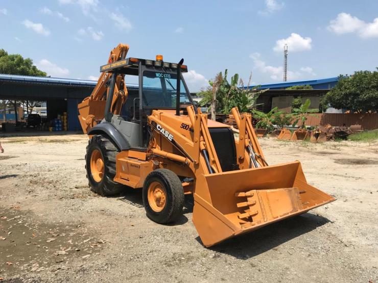 Pretech Construction backhoe loader on site
